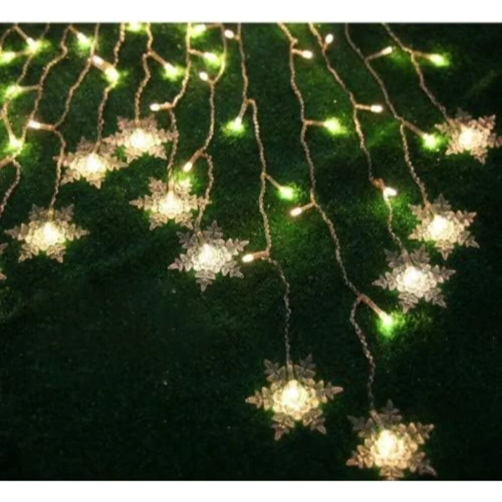 Warm White Snowflake Curtain Lights, 11.5ft - 80 LEDs for Indoor/Outdoor Use